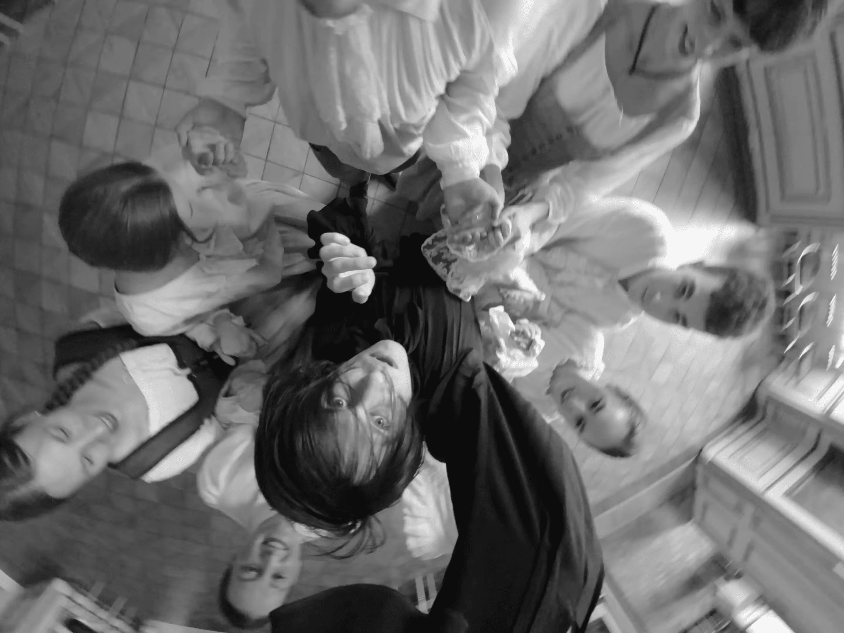 Ferdinand Left Boy surrounded by people in medieval clothing