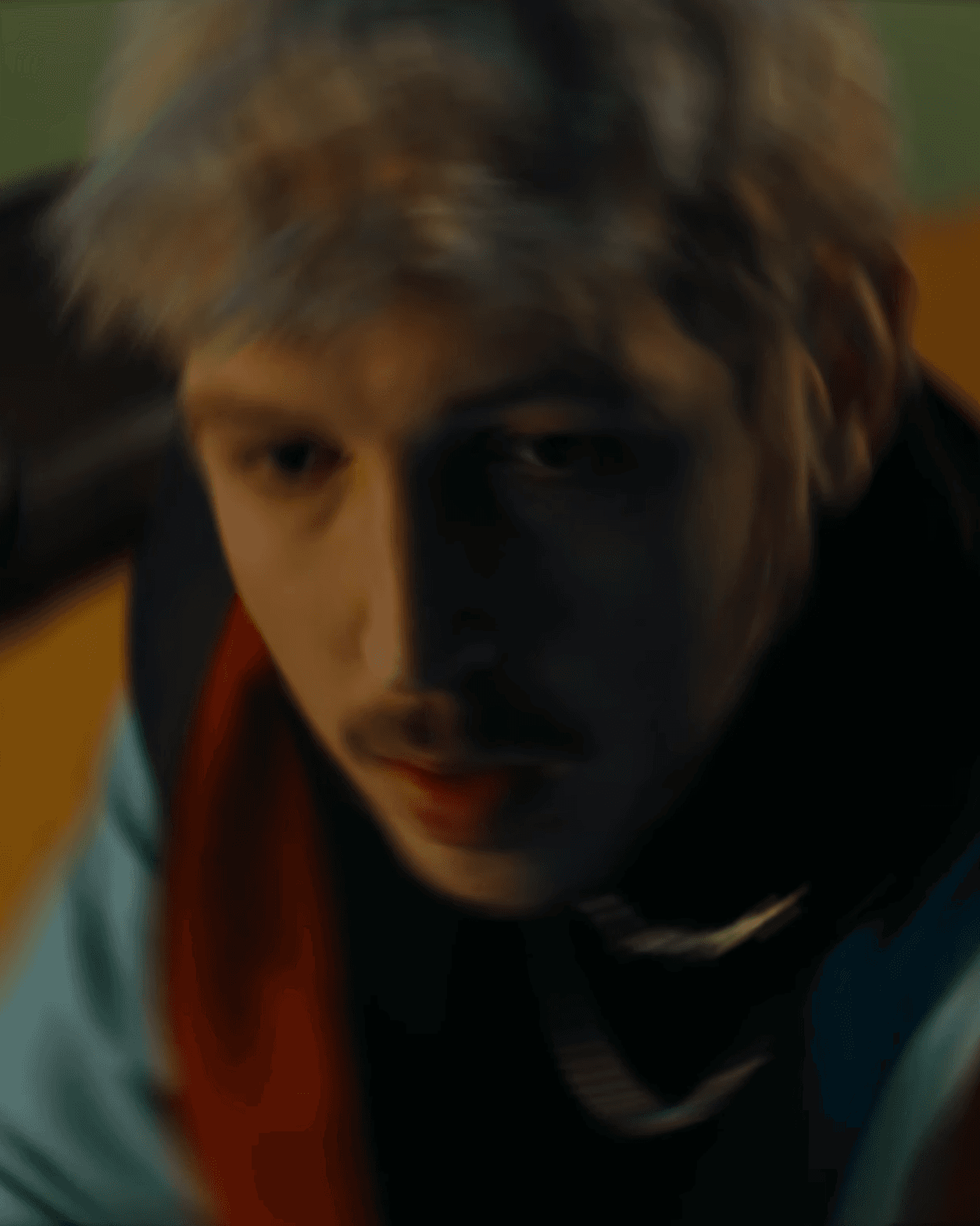 Man sitting on a bed